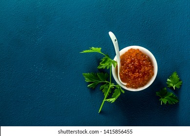 portion of red caviar on the table