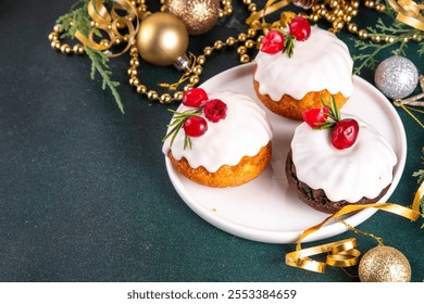 Portioned Christmas baked dessert, gingerbread chocolate and vanilla mini Christmas bundt cake with sugar glaze topping, cranberry and rosemary decor - Powered by Shutterstock