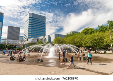 PORTLAND, OR - AUGUST 18, 2017: Tourists Visit City Center. Portland Attacts 3 Million People Annually.