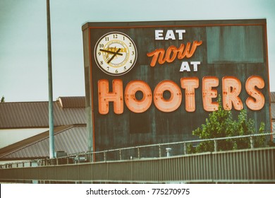 PORTLAND, OR - AUGUST 21, 2017: Hooters Sign Along City Streets. It Is Part Of A US Based Casual Dining Chain That Has Locations In Several Countries.