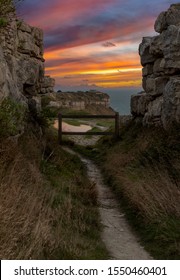 Portland
Dorset
England
Beautiful Sunset Seen From The South West Coast Path, Showing The Dramatic Cliff Scenery Of The West Coast Of Portland, At Tout Quarry