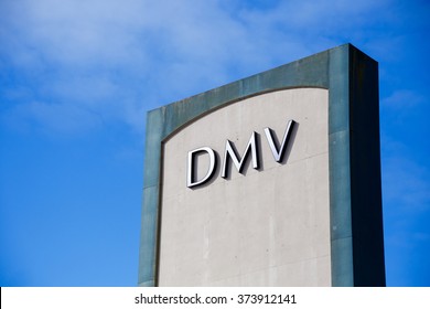 PORTLAND, OR - FEBRUARY 2, 2016: DMV or Department of Motor Vehicles sign against a blue sky.