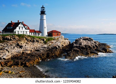 Portland Head Lighthouse stands on a rocky shore