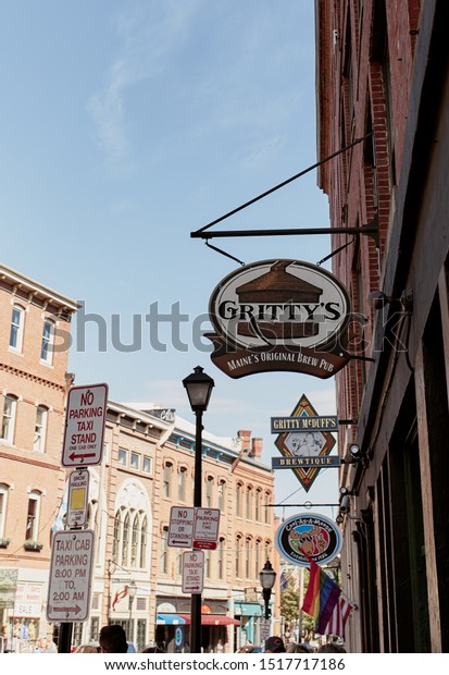 Portland, Maine - September 26th, 2019:  Commercial\
stores and restaurants in historic Old Port district of Portland,\
Maine.  