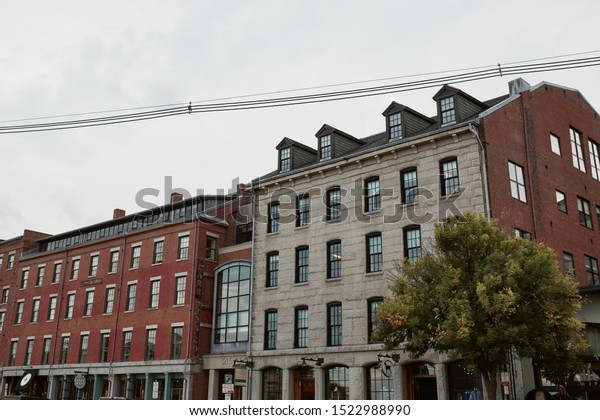 Portland, Maine - September 26th, 2019:  Exterior of\
brick buildings in historic Old Port district of Portland, Maine. \
