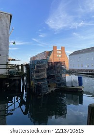 Portland, ME, USA, 9.4.22 - Piles Of Empty Lobster Traps Stacked On A Dock.