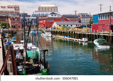 PORTLAND, ME, USA, AUGUST 10, 2015: Scenic view of working fishing ships and boats, dockside in Portland Maine's harbor.