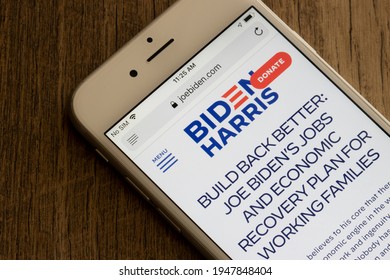 Portland, OR, USA - Apr 1, 2021: The webpage of Build Back Better Plan - jobs and economic recovery plan for working families - is seen on the website of President Joe Biden from a mobile phone.