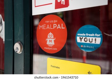 Portland, OR, USA - Apr 18, 2021: The MealPal Sticker Is Seen At A Restaurant In Downtown Portland, Oregon. MealPal Is A Monthly Meal Subscription Plan Partnered With Different Food Places.