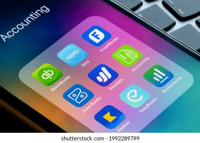 Portland, OR, USA - Apr 2, 2021: Assorted accounting apps are seen on an iPhone - QuickBooks, Xero, FreshBooks, Zoho Books, Receipts by Wave, Sage Accounting, Kashoo, EasyBooks, GoDaddy BookKeeping.