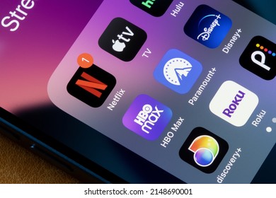 Portland, OR, USA - Apr 20, 2022: Assorted Streaming Apps Are Seen On An IPhone, Including Netflix, Apple TV, Hulu, HBO Max, Paramount Plus, Disney Plus, Discovery Plus, Roku, And Peacock.