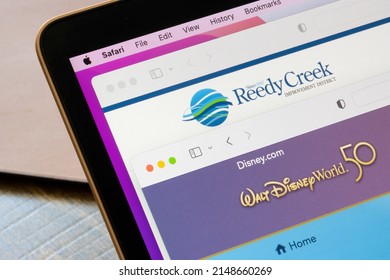 Portland, OR, USA - Apr 22, 2022: Homepages of Disney World and Reedy Creek Improvement District are seen on a laptop. Florida Republicans vote to dissolve Disney's special district as a retaliation.
