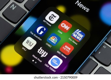 Portland, OR, USA - Apr 25, 2022: Assorted news apps, including New York Time, CNN, Fox News, The Guardian, CNBC, BBC News, WSJ, Washington Post, and USA Today, are seen on an iPhone.