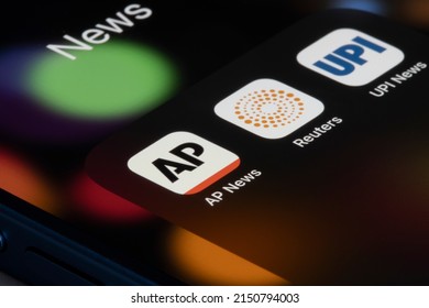 Portland, OR, USA - Apr 25, 2022: Mobile app icons of AP (Associated Press) News, Reuters, and UPI (United Press International) News are seen on an iPhone. Major international news agencies concept.