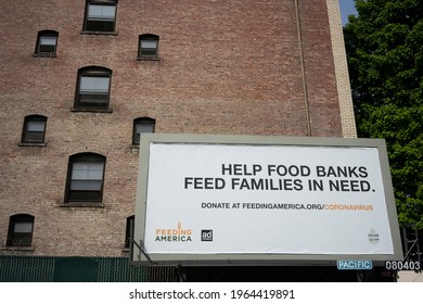 Portland, OR, USA - Apr 27, 2021: Feeding America Billboard Is Seen In Downtown Portland, Oregon, During The COVID Pandemic. Feeding America Is A Nonprofit With A Nationwide Network Of Food Banks.