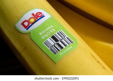 Portland, OR, USA - Apr 28, 2021: Closeup Of The Dole Food Company Branded Sticker Seen On Fresh Bananas Imported From Ecuador.