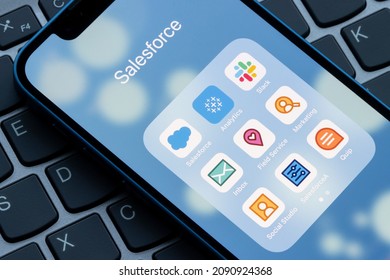 Portland, OR, USA - Dec 14, 2021: Assorted Salesforce apps are seen on an iPhone, including Salesforce, Tableau Analytics, Slack, Inbox, Field Service, Marketing, Social Studio, SalesforceA, and Quip.