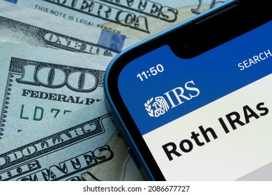 Portland, OR, USA - Dec 3, 2021: The Roth IRAs Page On The IRS Website Is Seen On An IPhone. A Roth IRA Is An Individual Retirement Account Under US Law That Is Generally Not Taxed Upon Distribution.