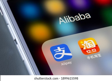 Portland, OR, USA - Dec 31, 2020: Icons of Alibaba Group's Alipay and Taobao are seen on an iPhone. Alipay is a third-party mobile and online payment platform while Taobao is an e-commerce site.