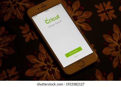 Portland, OR, USA - Feb 22, 2021: Cricut Design Space app login page is seen on an iPhone. Cricut is a companion app that works with Cricut Maker and Cricut Explore family smart cutting machines.