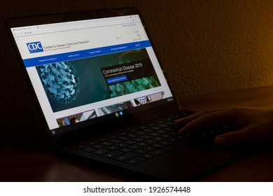 Portland, OR, USA - Feb 26, 2021: A Man Browses The CDC Website To Learn The Latest Info About The Coronavirus Disease 2019 (COVID-19).