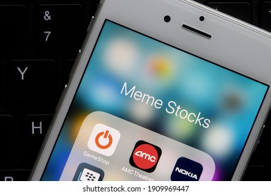 Portland, OR, USA - Feb 4, 2021: GameStop, AMC Theatres, Nokia, and BlackBerry Enterprise app icons are seen on an iPhone. Meme stock is a term for a stock that is heavily influenced by people online.
