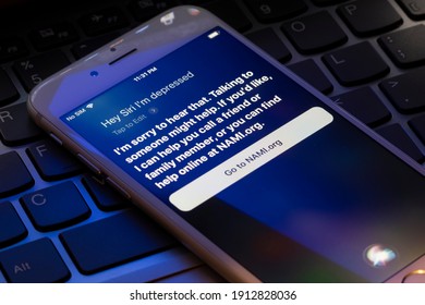 Portland, OR, USA - Feb 8, 2021: Conversations with Siri are seen on an iPhone. An estimated 19 million American adults are living with major depression.
