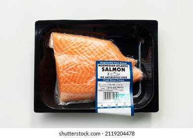 Portland, OR, USA - Jan 10, 2022: Fresh Norwegian Atlantic Salmon Fillet In An Air-tight Plastic Packaging With An ASC (Aquaculture Stewardship Council) Responsibly Farmed Label Isolated On White.