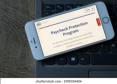 Portland, OR, USA - Jan 22, 2021: The U.S. Small Business Administration Website's Paycheck Protection Program (PPP) Page Is Seen On A Phone. PPP Loan Helps Businesses Keep Their Workforce Employed.