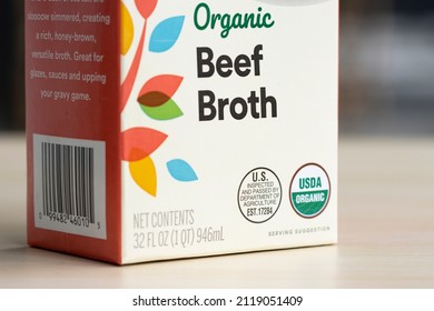 Portland, OR, USA - Jan 30, 2022: A USDA mark of inspection and establishment (EST number) and a USDA Organic label are seen on a carton of 365 by Whole Foods Market branded organic beef broth.