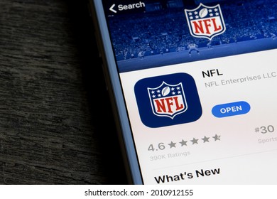 Portland, OR, USA - July 19, 2021: The NFL mobile app is seen in the App Store on an iPhone. The National Football League (NFL) is a professional American football league.