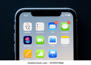 Portland, OR, USA - Mar 12, 2021: Productivity Apps By Apple Are Seen On An IPhone - Calendar, Reminders, Mail, Messages, Shortcuts, FaceTime, Files, Notes, Pages, Numbers, And Keynote.