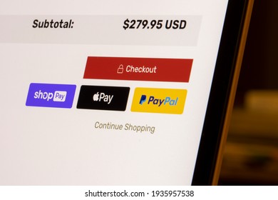 Portland, OR, USA - Mar 13, 2021: Shop Pay By Shopify, Apple Pay And PayPal Payment Options Are Seen On An Online Store's Checkout Page On A Laptop Computer.