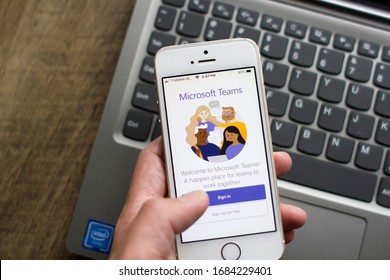 Portland, OR, USA - Mar 14, 2020: A user opens the Microsoft Teams mobile app. Teams is a unified team communication and collaboration platform with workplace chat, video meetings, and file storage.