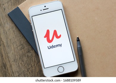 Portland, OR, USA - Mar 30, 2020: Udemy mobile app welcome page is seen on a smartphone. Udemy is an online learning platform and teaching marketplace aimed at professional adults and students.