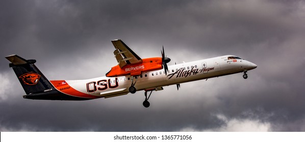 Portland, Oregon - 8/7/2016: Alaska airlines, Horizon Air lines, Oregon State University Beavers,  Bombardier CRJ-700 aircraft.