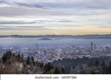 Portland Oregon Downtown Foggy Cityscape Skyline with Mount Hood at Sunset