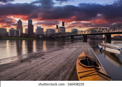 Portland, Oregon Panorama.  Sunset scene with dramatic sky and light reflections on the Willamette River. - Powered by Shutterstock