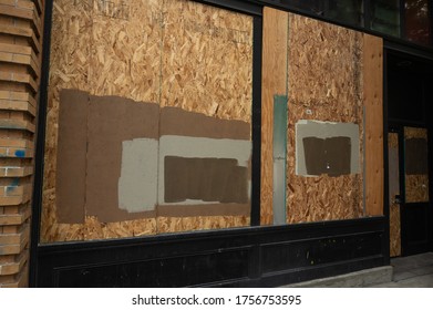 Portland Oregon State. USA 06.12.2020. BLACK LIFE IS MATTER, plywood walls, clogged with vandalism, business preservation