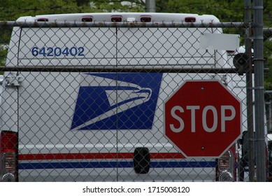 Portland, Oregon / United States - April 26, 2020: United States Postal Service (USPS) Mail Delivery.