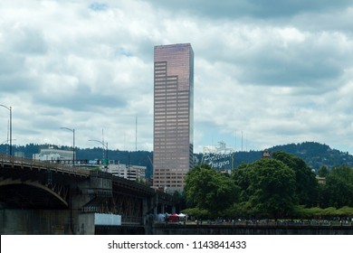 Portland, Oregon, USA. June 2018. U.S Bancorp Tower And Portland Oregon  Sign With Burnside Bridge In The Foreground.