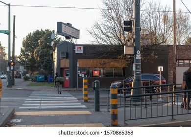 Portland, Oregon / USA - November 20 2019: Exterior Of George's Corner Tavern On North Killingsworth Street And North Interstate Avenue, As Seen From The Yellow Line MAX Station