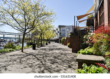 Portland, Oregon's Mixed Use Development Near The Downtown Area Provides Easy Access To Many Services To Residents And Foot Traffic.