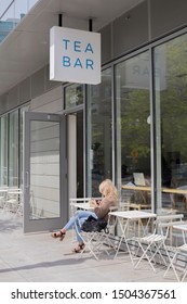 Portland, Oregon/United States – 04/25/2019: A Customer Sits Outside Of Tea Bar, A Hip Tea Cafe In The Pearl District Of Portland.