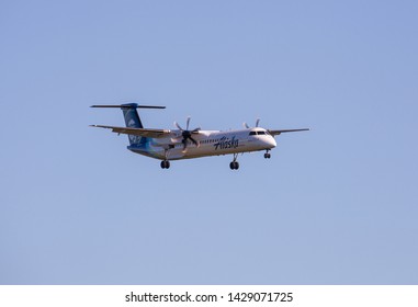 Portland, Oregon/USA-June 8, 2019: Airplane Of Alaskan Airlines Landing In PDX International Airport