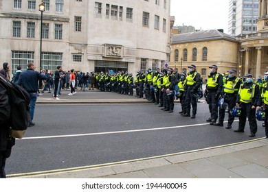 PORTLAND PLACE, LONDON, ENGLAND- 20 March 2021: Line Of Police Outside The BBC Broadcasting House, At Vigil For The Voiceless Anti-lockdown Protest In London