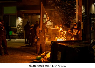Portland protest has been ongoing since George Floyd's death. Many protesters were demanding to correct the systematic problem and defund the police. Photos were taken in Portland, OR,USA on 8/9/2020