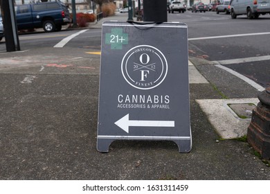 Portland, OR / USA - December 13 2019: Oregon Finest Cannabis Dispensary Store Sign On The Sidewalk.