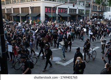 Portland, OR / USA - June 1 2020: Large Crowd Of Young Protesters In Downtown George Floyd Killing Demonstration.