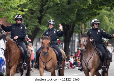 Portland, OR / USA - June 11 2016: Three Police Officers On Horses At Grand Floral Parade